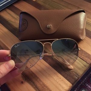 Two-tone gold RayBan aviator sunglasses with case.